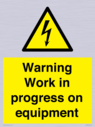 warning-work-in-progress-on-equipmentwith-electrical-hazard-symbol~